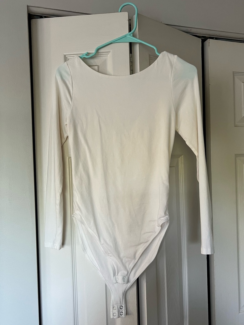 Cream Long Sleeve Bodysuit with low scoop back